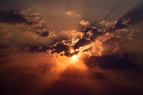 Sun Covered by Clouds During Sunset