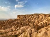 Brown Rock Formation Under Blue Sky