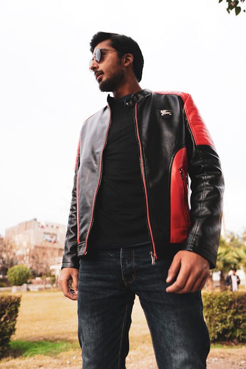 Man in Leather Jacket Looking Away