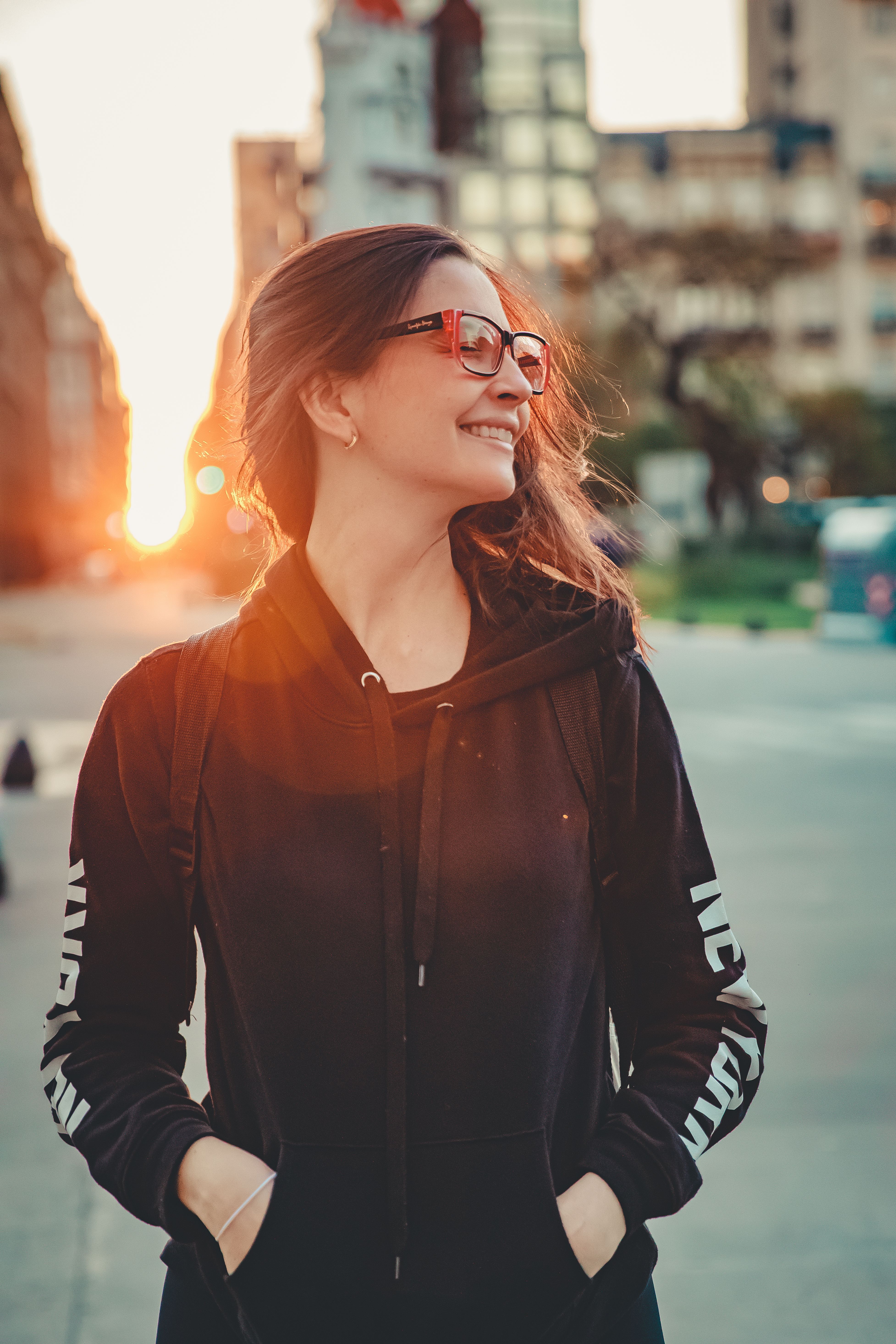 Woman In Black Hoodie Wearing Eyeglasses Free Stock Photo