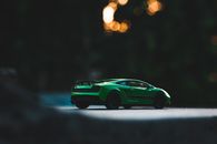 Green Porsche 911 on Road