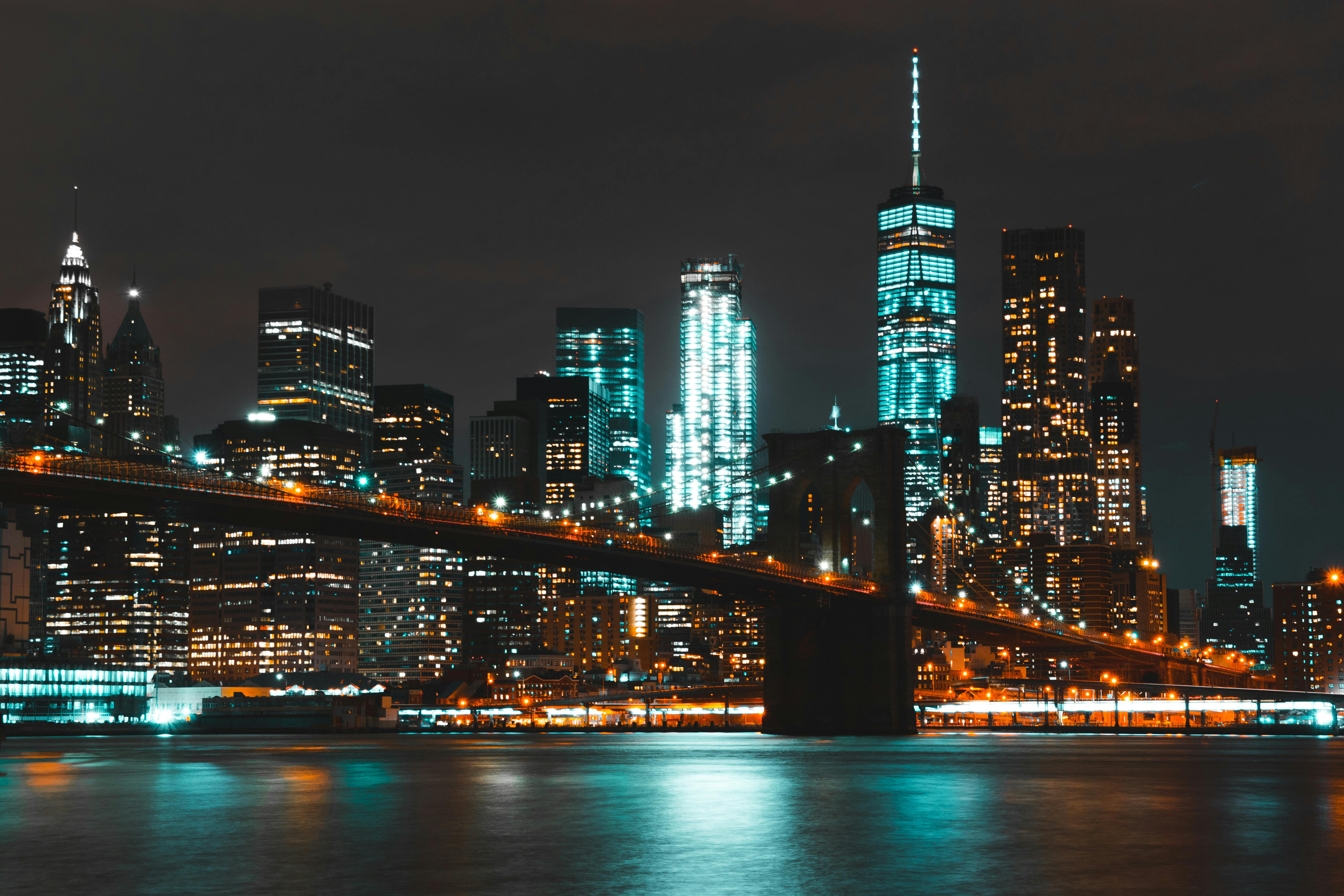 lighted brooklyn bridge during nighttime