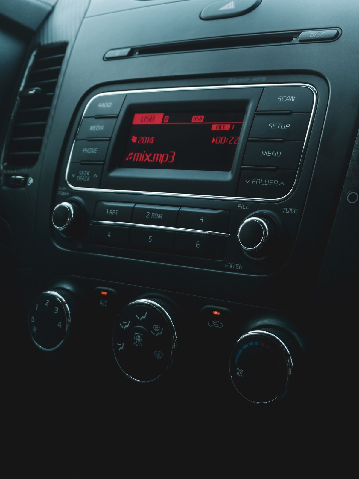 Real close-up of vehicle dashboard controls and automotive electronics