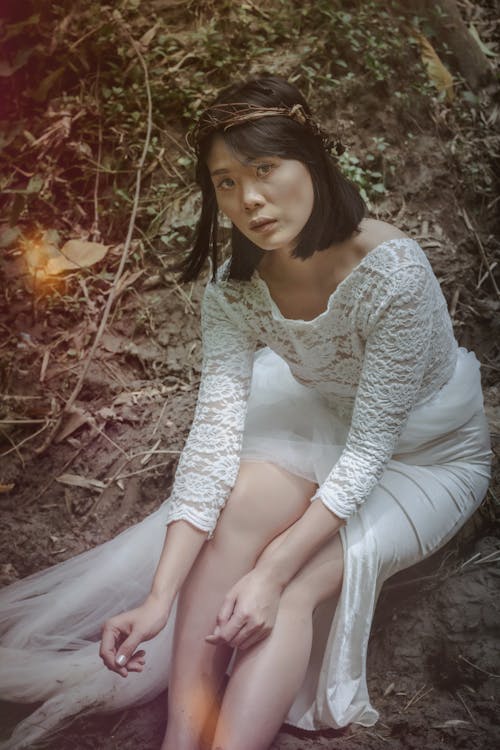 Graceful Asian woman in forest