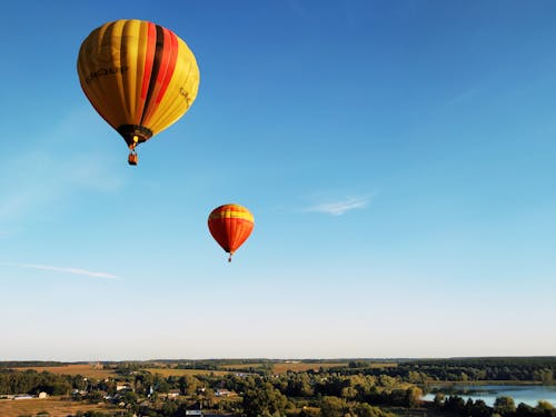 Бесплатное стоковое фото с горячие воздушные шары, летающий, самолеты
