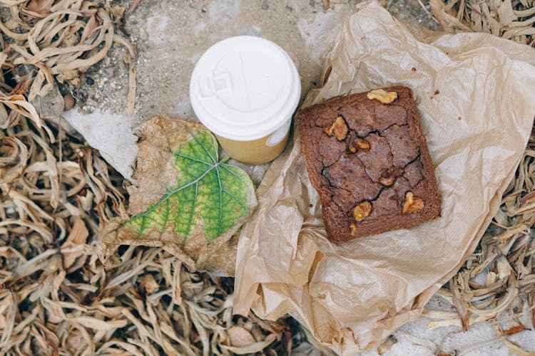 Overhead Shot Of A Brownie And A Beverage In A Disposable Cup
