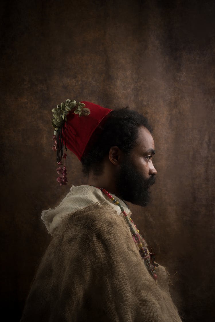 A Portrait Of A Man In A Fez