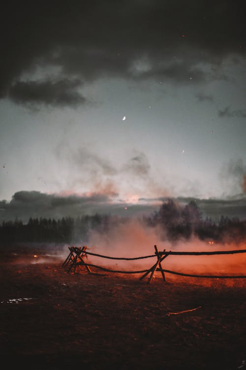 View of Smoke over the Ground at Sunset 