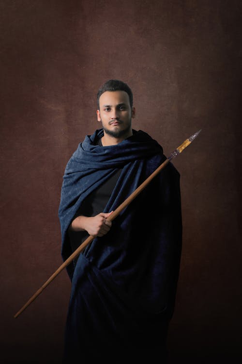 Free A Portrait of a Soldier Holding a Spear Stock Photo