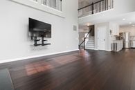 Black Flat Screen Tv on White Wall
