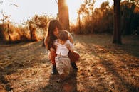 Woman with son walking in park