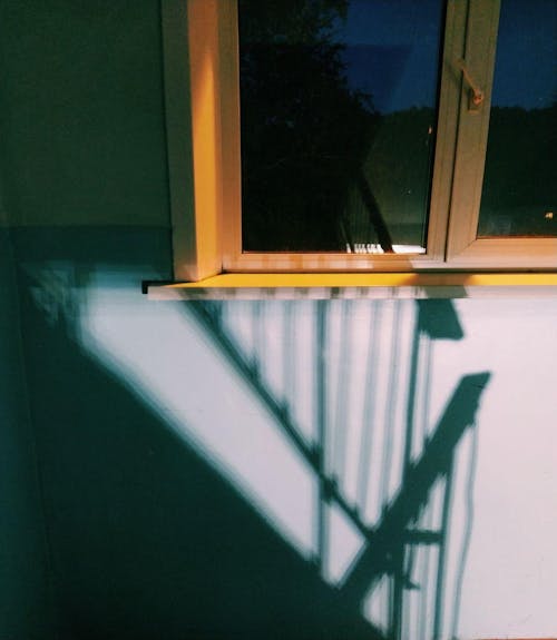 Window and Wall with Shadow of Railings 