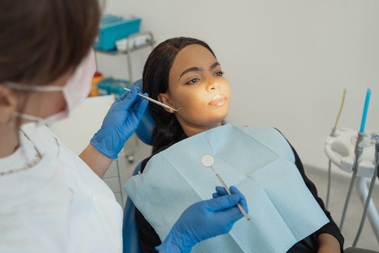 A Patient Wearing A Dental Bib