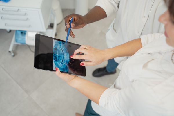 Caregiver with elderly patient at home