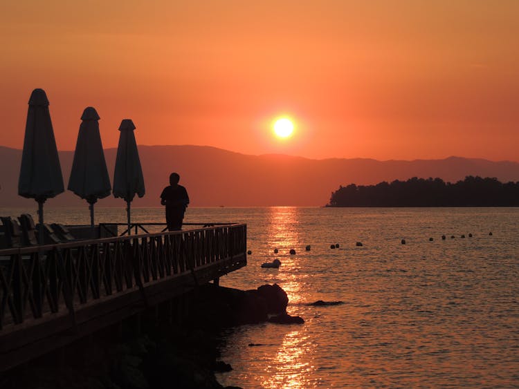 A Scenic Sunrise By The Seaside In Kontokali, Greece