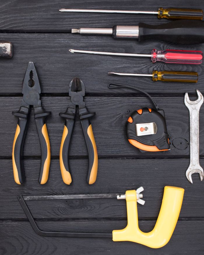 Flat lay of mechanical repair tools used for compressor work Flat lay of mechanical repair tools used for compressor work