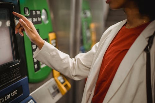 Free Close-up Photo of Person using an ATM Stock Photo
