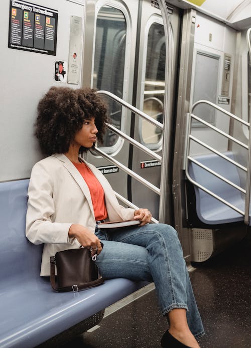 A Woman Riding a Train