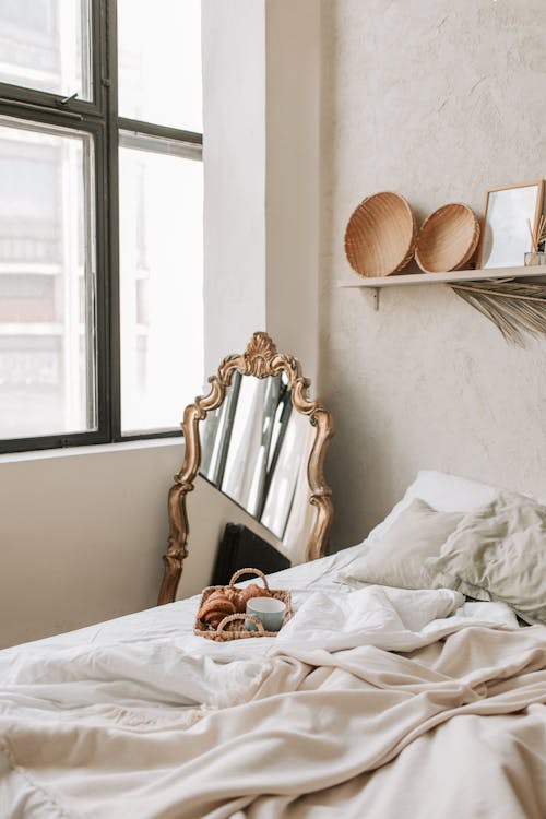 Free Photo of a Mirror Near a Bed Stock Photo