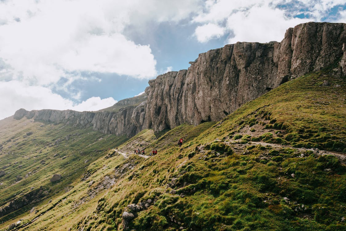 People Hiking a Mountain