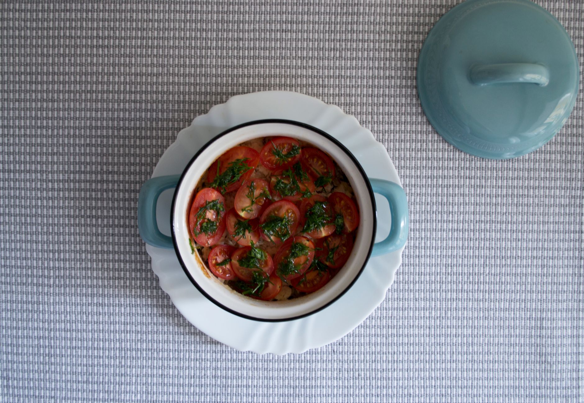Herbs and cheese for customizing dishes in mini cocotte
