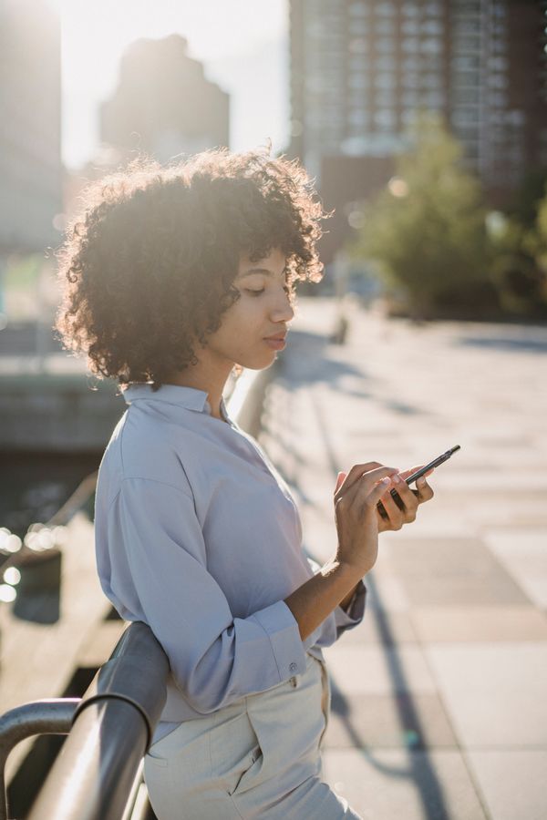 Person checking their phone — photo by Roberto Hund on Pexels