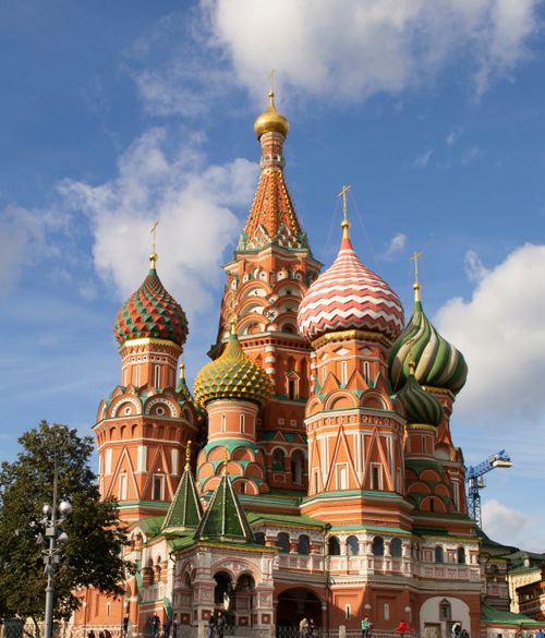 Free Iconic St. Basil's Cathedral in Moscow under a bright blue sky, a historic Russian landmark. Stock Photo
