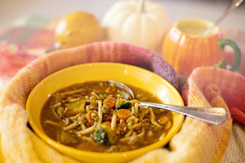 Close-Up Photograph of a Bowl with Soup