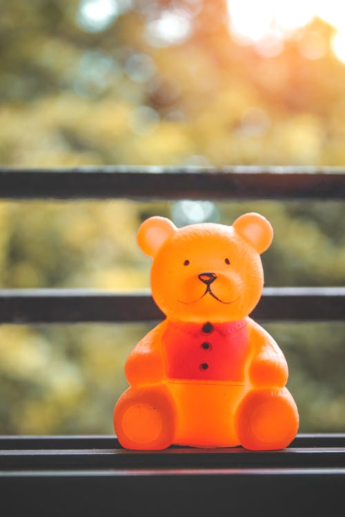 Free Yellow Bear On A Bench Stock Photo