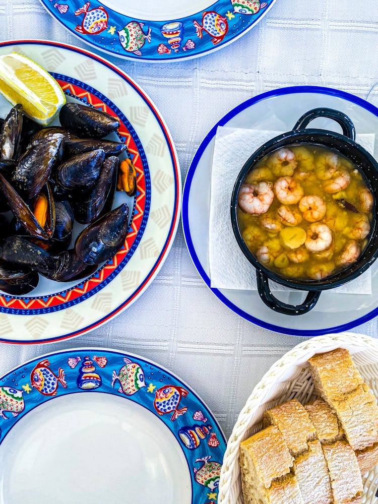 Overhead Shot Of Plates With Seafood