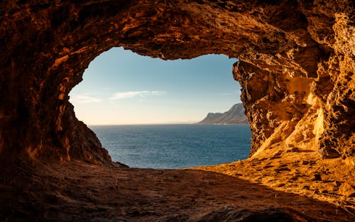 Free Photo of a Cave Near an Ocean Stock Photo