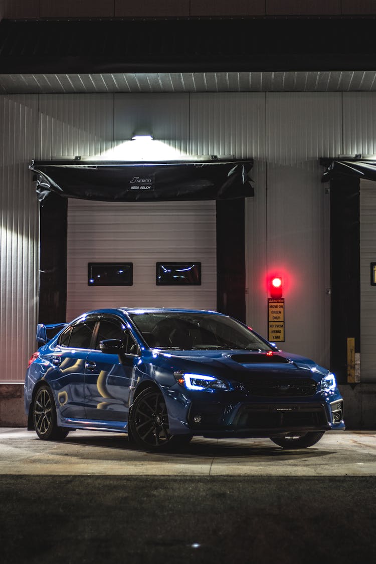 Photograph Of A Blue Racecar