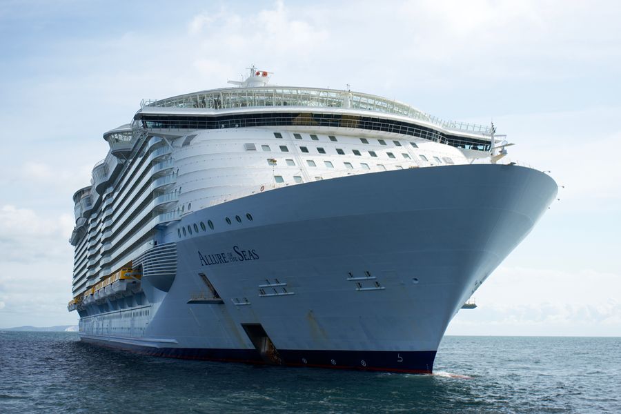 Large full-size cruise liner, Allure of the Seas, sailing on open water