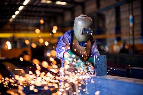Welder Working in Protective Clothing