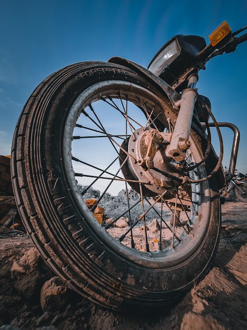 Low-Angle Shot of a Motorcycle's Wheel