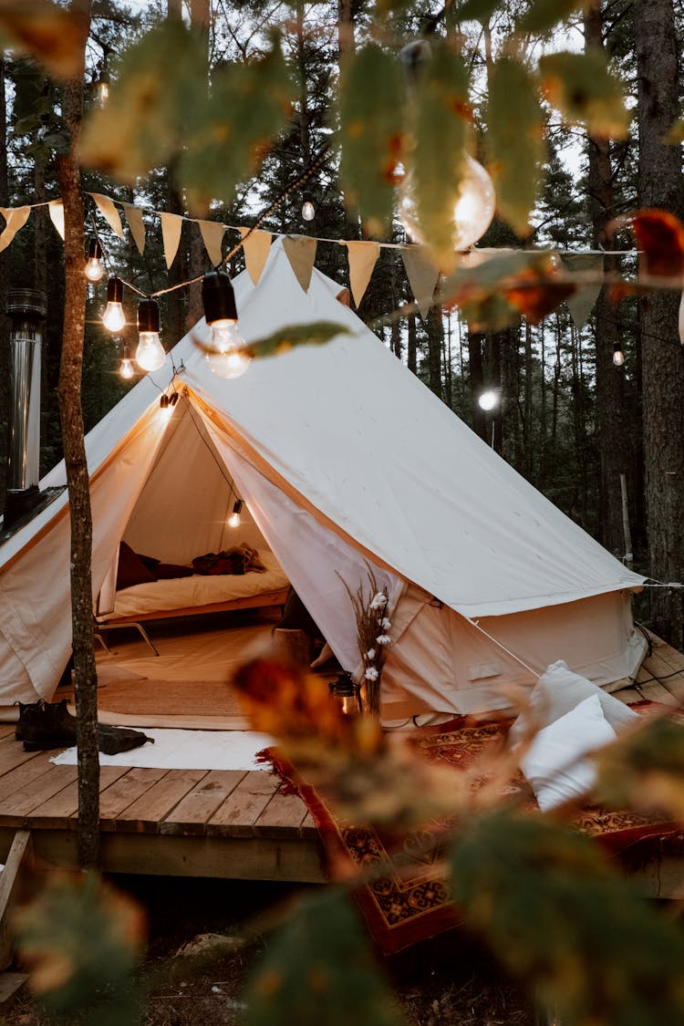 A Luxurious Tent On A Campsite In A Forest