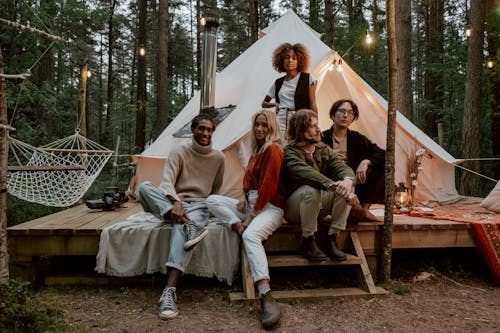 Free Photograph of a Group of Friends Camping Stock Photo