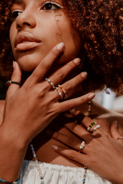 Close-Up Shot of a Pretty Curly-Haired Woman