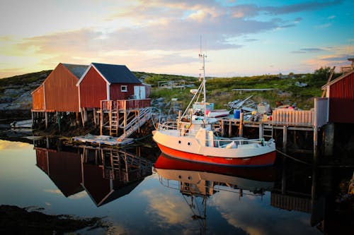 Free Fishing Boat Docked by Pier  Stock Photo