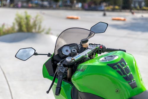 Close-Up Shot of a Green Motorcycle