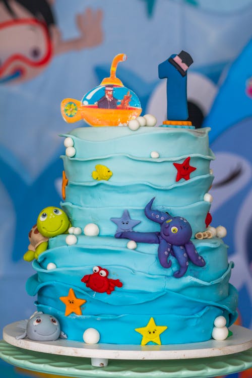 Close-Up Shot of a Blue Birthday Cake