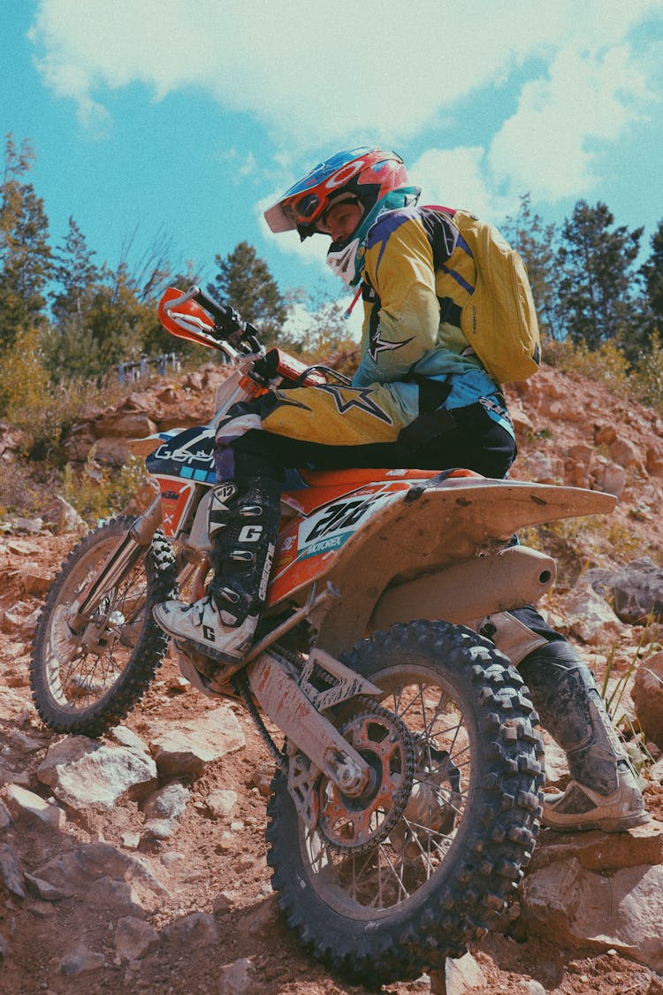 A Man Riding A Dirt Bike