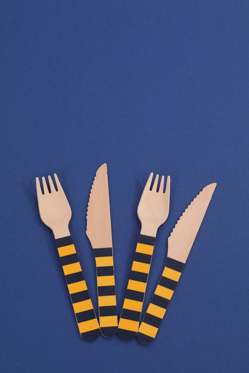 Free Pairs of Striped Knives and Fork Stock Photo