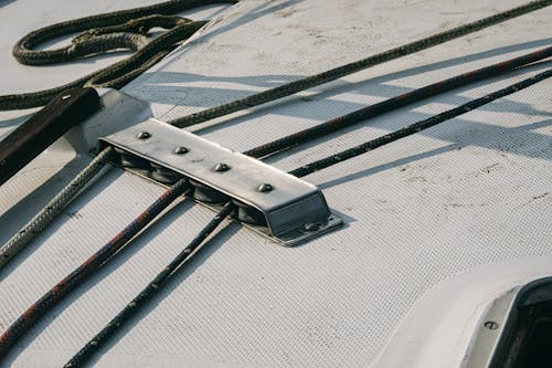 Steel cables on white dock