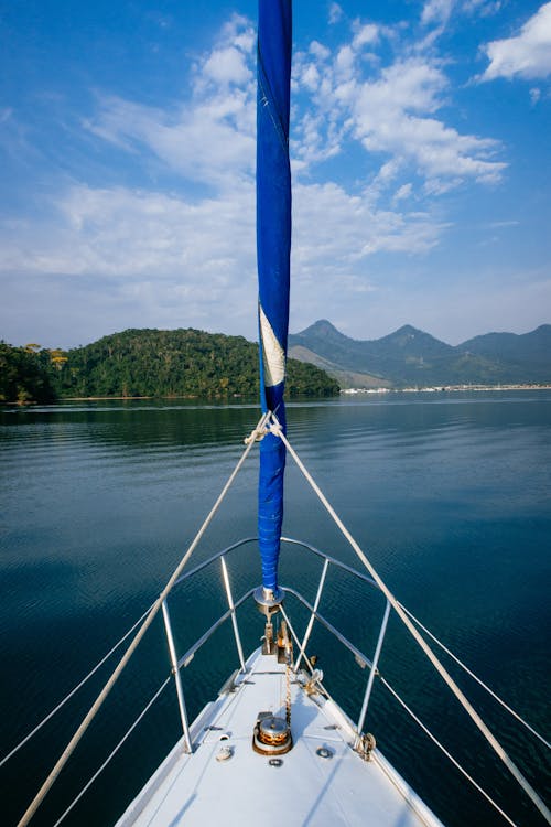 Free Sailboat floating on calm sea Stock Photo