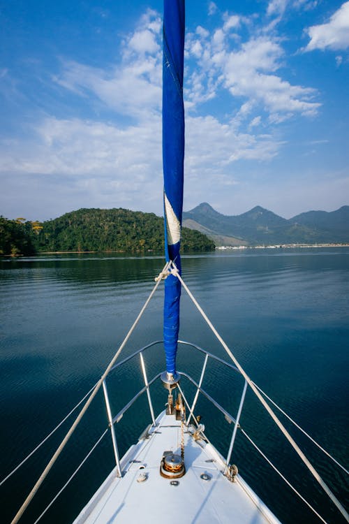 Sailboat floating on calm sea