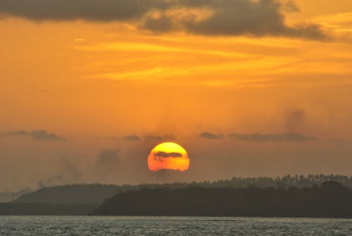 Free Silhouette of Island during Sunset Stock Photo