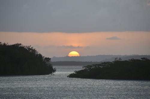 Silhouette of Island during Sunset