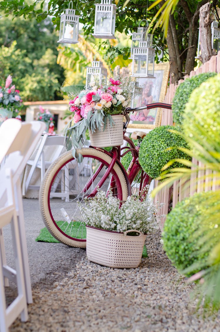 Flowers On The Basket Of A Bike