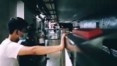 People Walking on a Subway Station